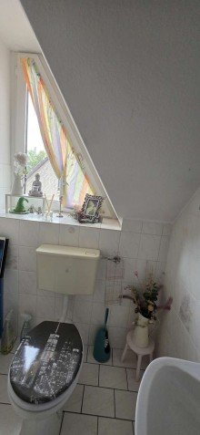 G�ste-WC OG  Investieren Sie in Geborgenheit: Zweifamilienhaus in familienfreundlicher Siedlung!