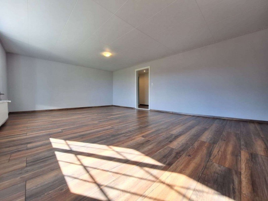 Wohnzimmer Whg. hinten Zweifamilienhaus Bunde